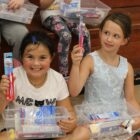 RS -- Smile Strong CNF Grand View students receiving their dental kits Smiling Strong