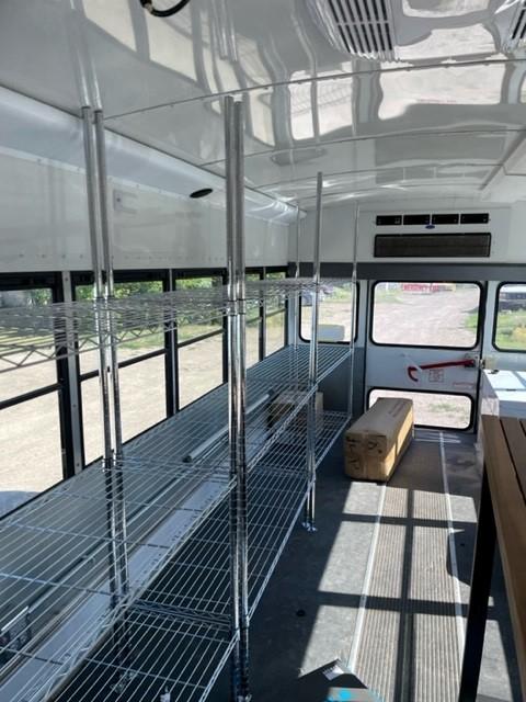 bus inside Mobile Market to Bring Fresh Produce to Residents on the Pine Ridge Indian Reservation Each Week