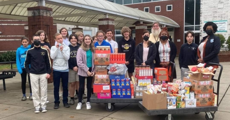 Dreamstarter Teacher John Price: School Assembly, and students, teach Catawba History