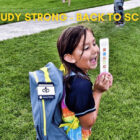 Native American child with a backpack in the 'Study Strong' back-to-school initiative.