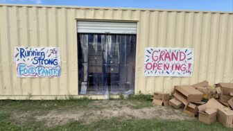 Running Strong Food Pantry grand opening at Oyate Ta Kola Ku Community Center, showing the new container pantry ready to serve local families.