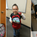 Native American children holding Smart Sacks food items provided to prevent hunger over the weekend