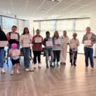 Participants holding certificates after completing the Haida Language Revitalization workshop in Seattle led by Elizah Dominy