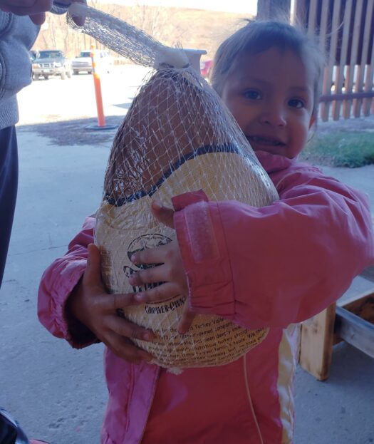 19_Tipi_waste_girl_with_turkey_CROPPED_(1)