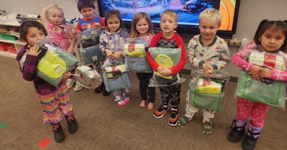 Children Receiving Winter Warmth Kits