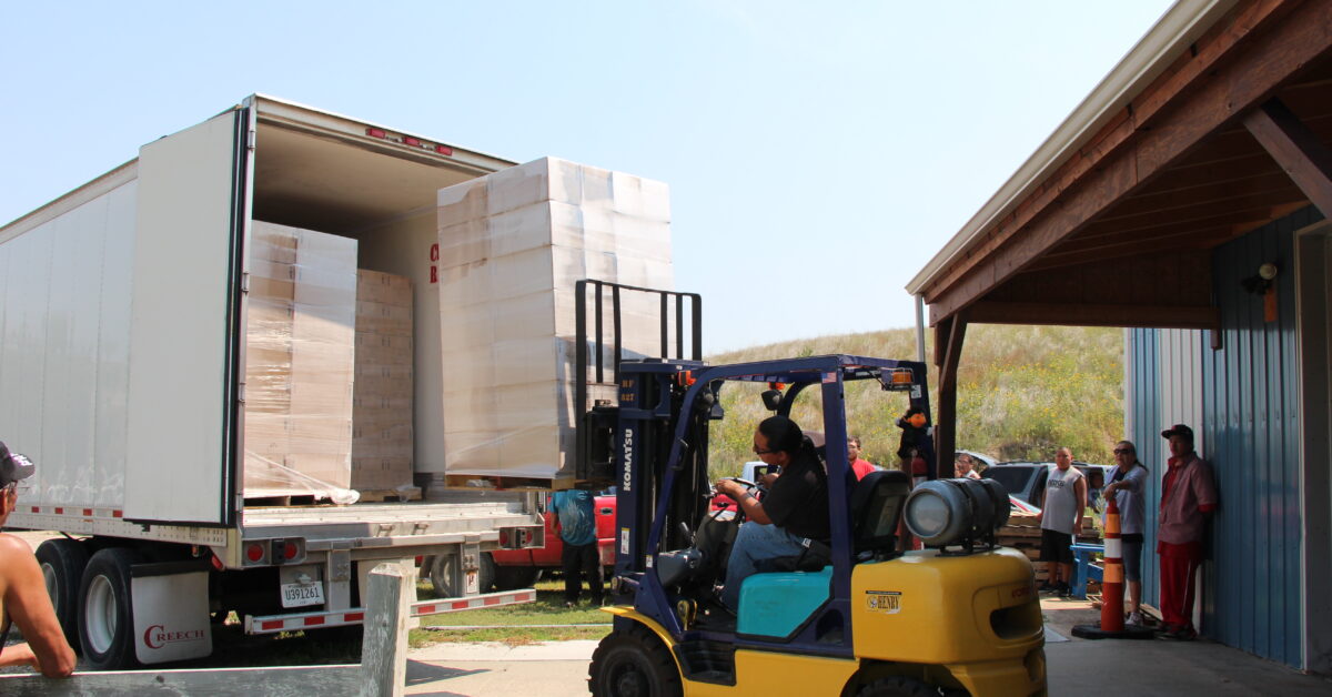 FY14_111_Tipi_Waste_DLE_unloads_3