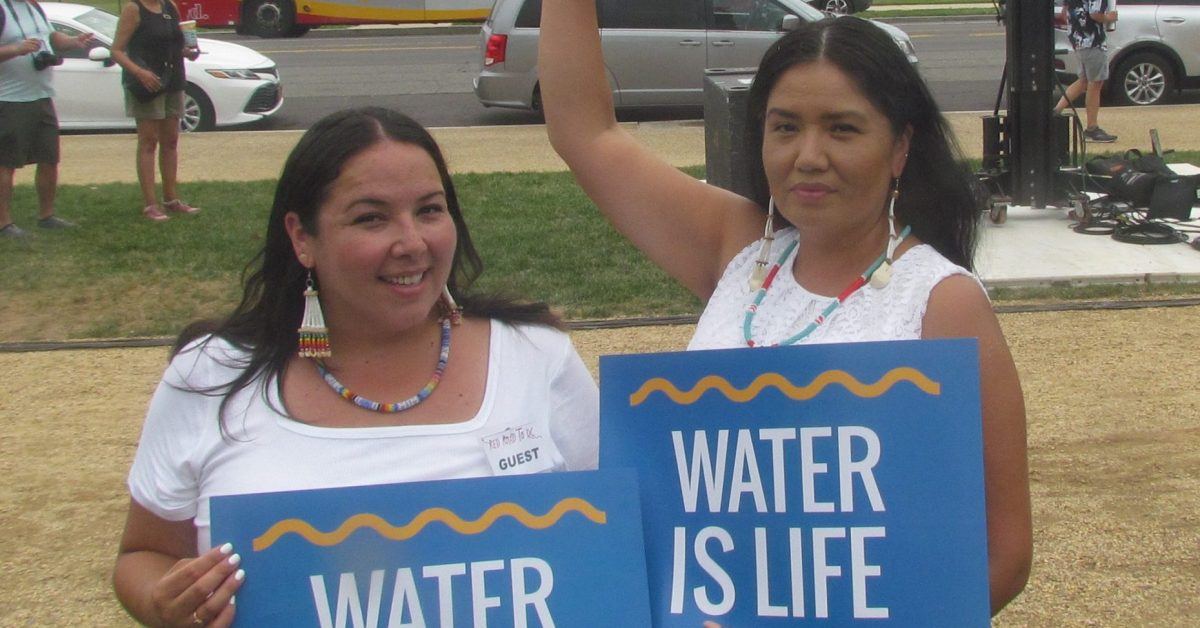 RS -- Red Road to DC Kim Ironroad, left, External Affairs Director, Standing Rock Water is Life Sign Capitol_3601