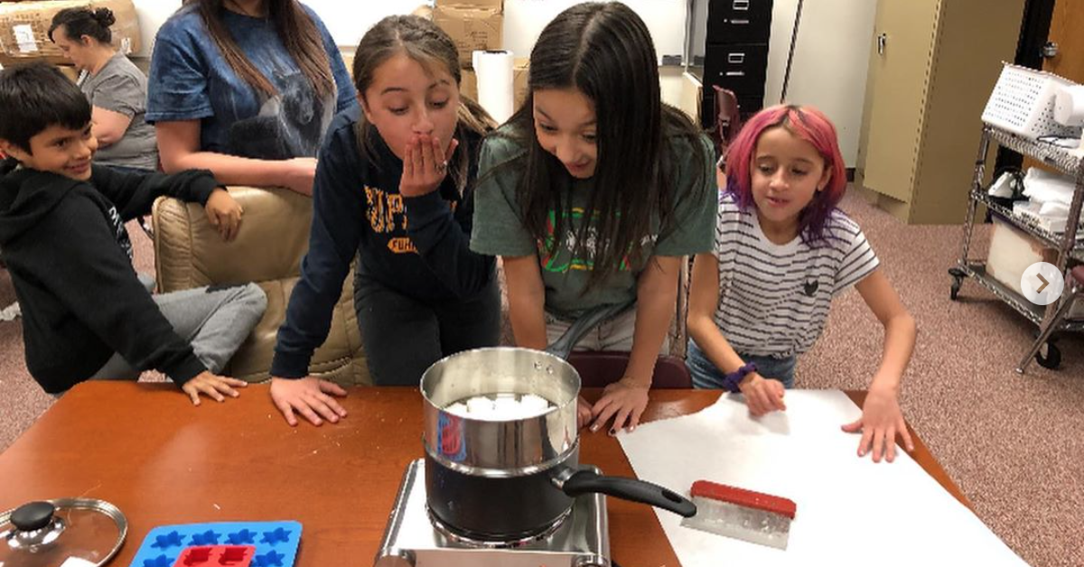 2019 Dreamstarter Taylor Eddie's class admires their goat milk fudge, milked from their classroom's goat.