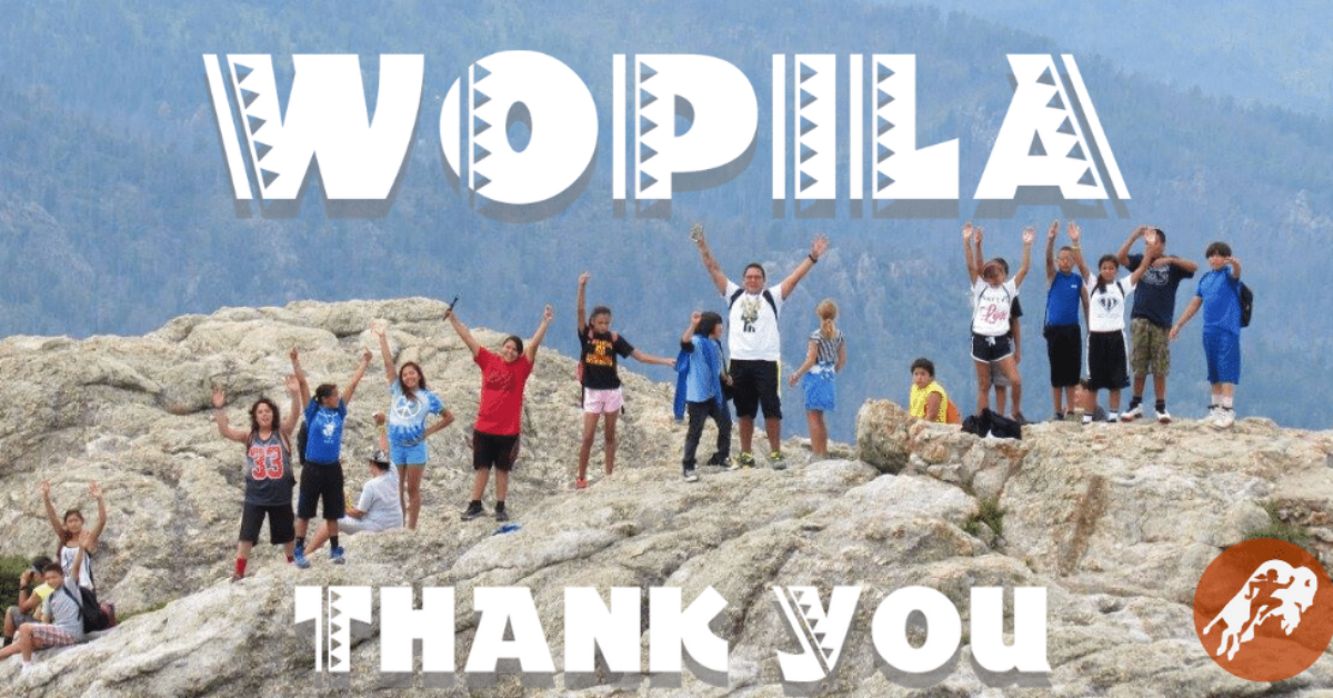 Wopila-Thank_you_crowd_on_rock