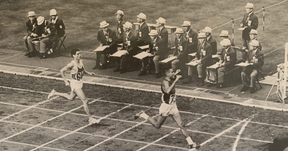 billy crossing the finish line race winning tokyo