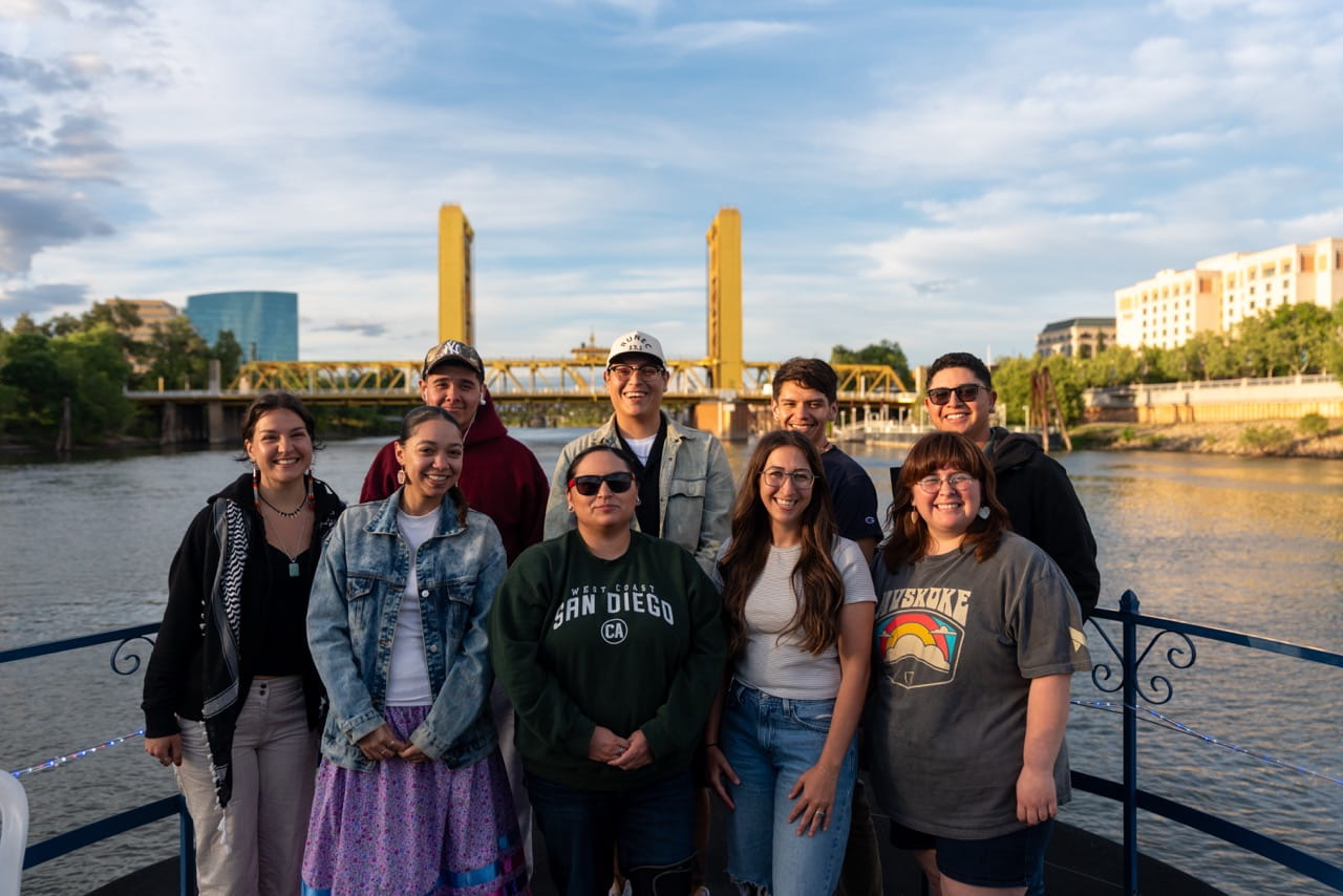 Dreamstarter Academy participants gather along the Sacramento River during the 2026 Running Strong for American Indian Youth leadership program focused on food sovereignty and Native youth empowerment