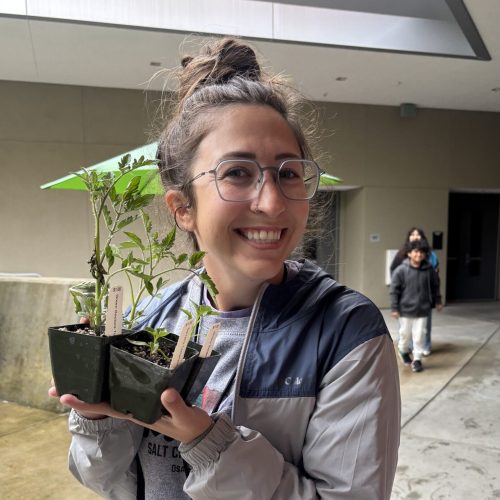 Harliegh with garden plant