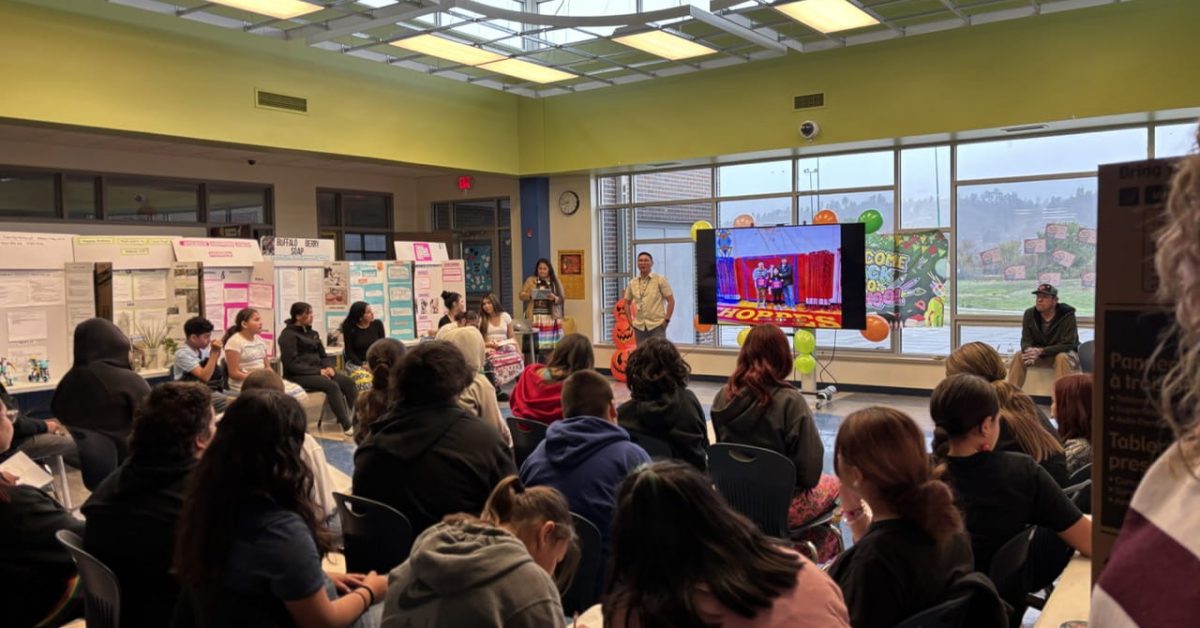 Ronald Brillantes with students during a school science and engineering fair at Porcupine School