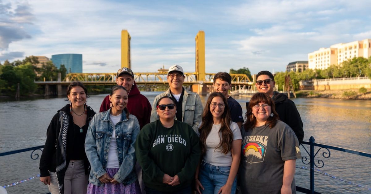 Dreamstarter Academy participants gather along the Sacramento River during the 2026 Running Strong for American Indian Youth leadership program focused on food sovereignty and Native youth empowerment