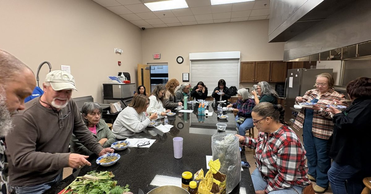 Community members gather at a Lumbee Food Collective workshop to learn about traditional Lumbee foods, root vegetables, and cultural food practices.